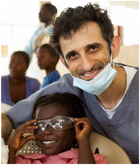 Dr. Shuaib Malik with samll child