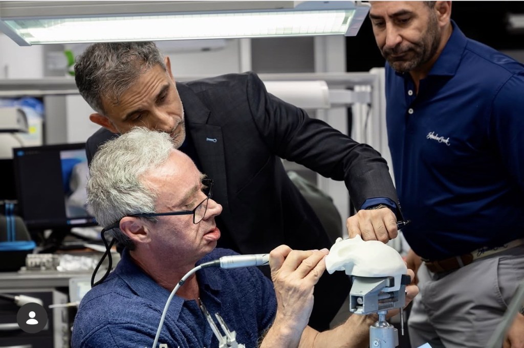 Dr. Malik showing mockup